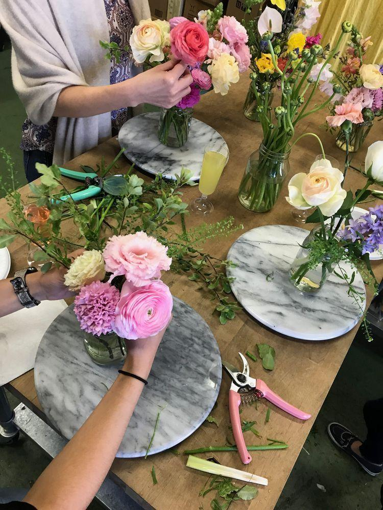 Guests composing their own floral arrangements