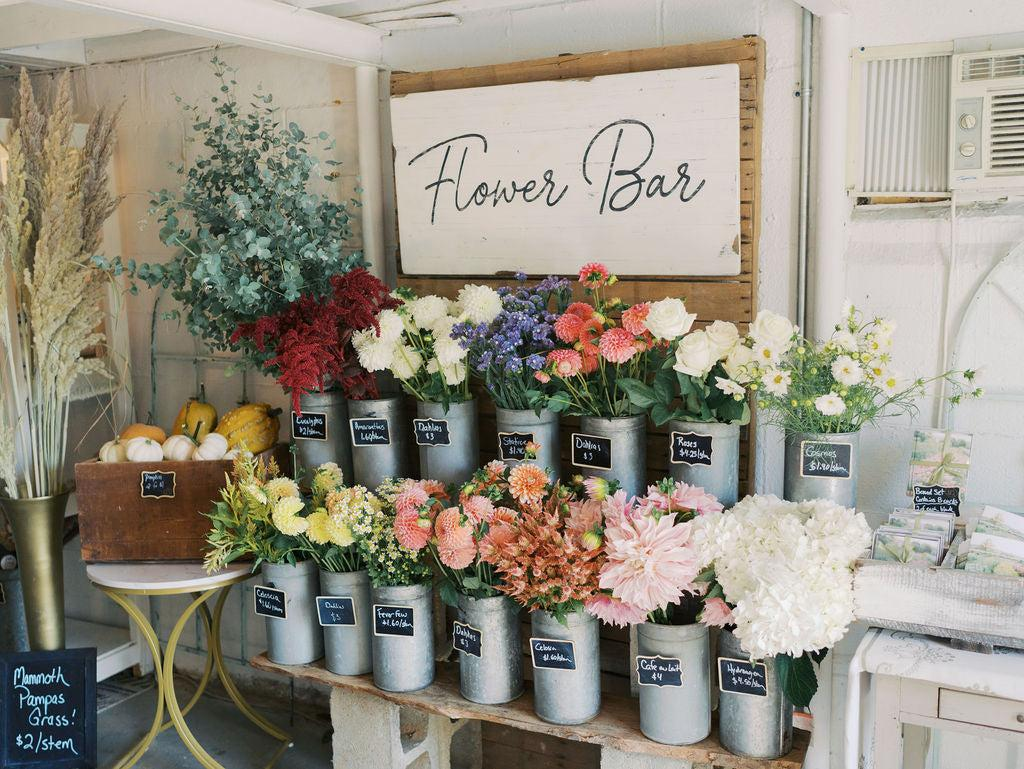 Fresh stems displayed at a flower bar